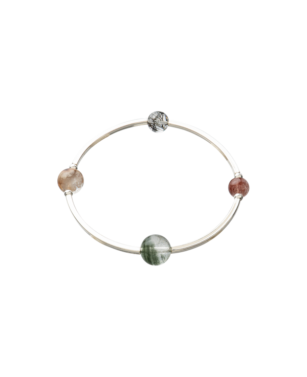 4Play Bangle showcasing four vibrant gemstones encircled by sterling silver for a timeless and playful design.