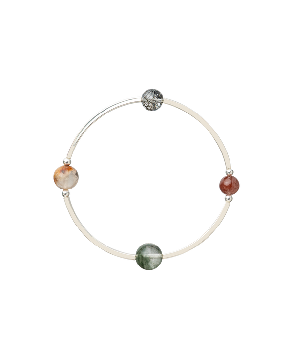 4Play Bangle featuring four luminous gemstones set in sterling silver, showcasing unique natural beauty.