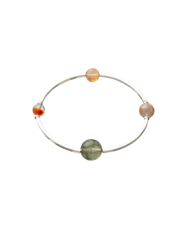 4Play Bangle with four colorful gemstones encircled by sterling silver, showcasing nature’s beauty.