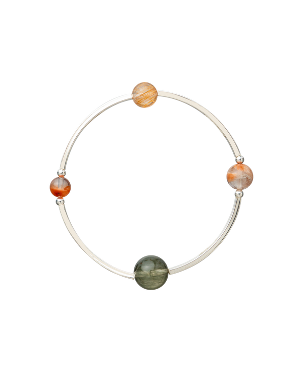 4Play Bangle featuring four gemstones in a sterling silver design, showcasing natural beauty and unique stories.