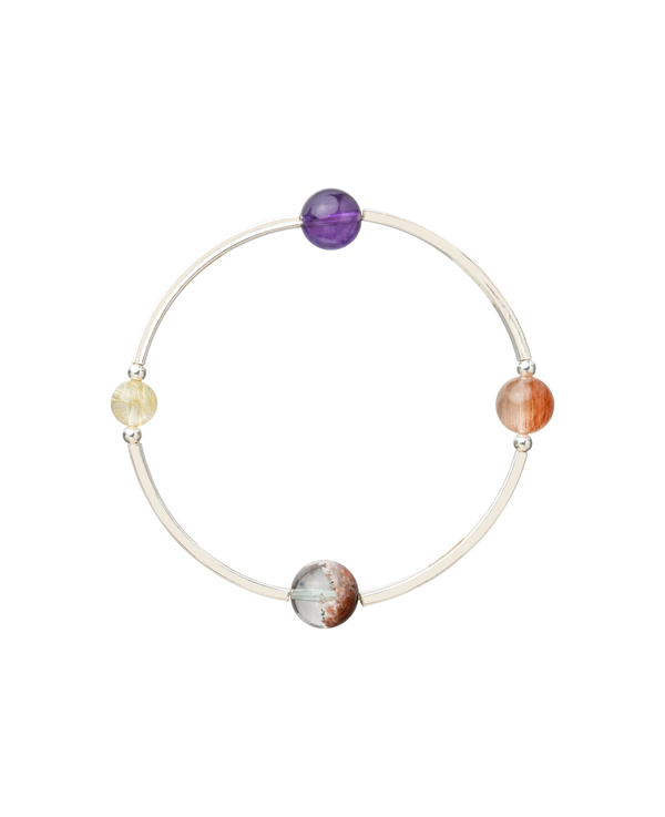 4Play Bangle featuring four colorful gemstones encircled by sterling silver, showcasing natural beauty and elegance.