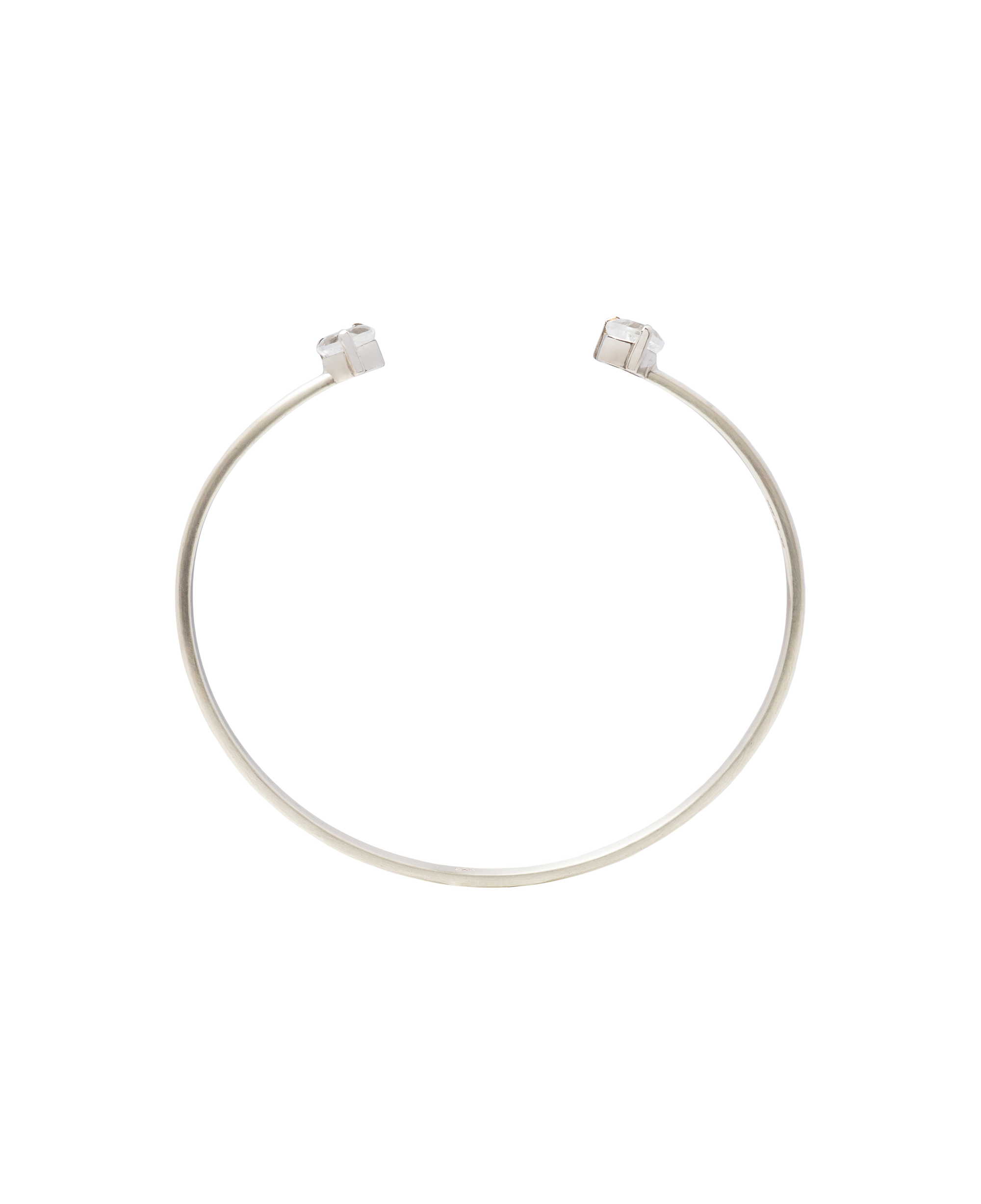 White Noise Echo Bangle made of high-polished sterling silver with rock crystal accents.