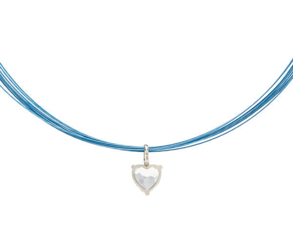 White Noise Beat Pendant Necklace with crystal heart in geometric sterling silver frame on blue strands.