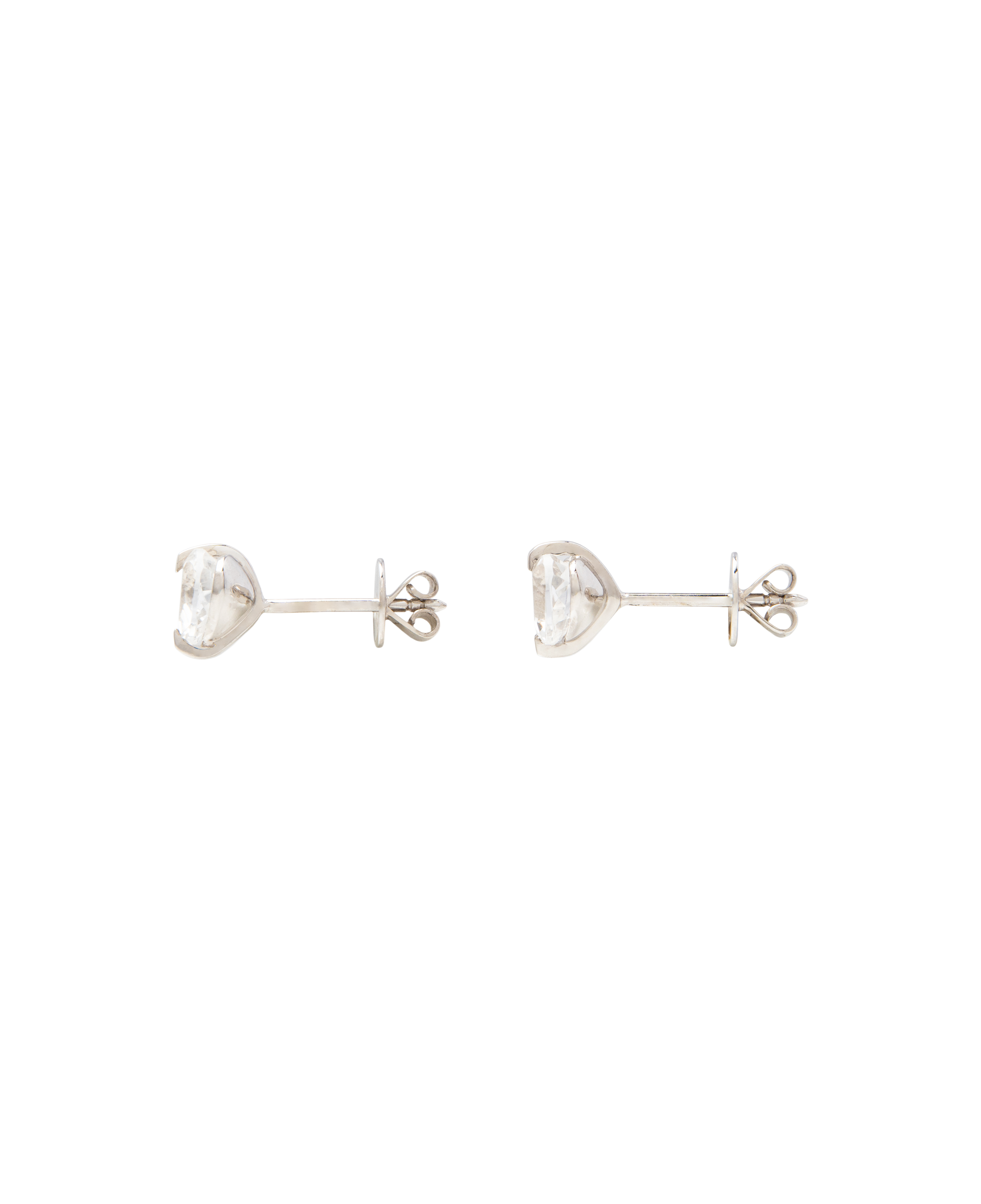 White Noise Pulse Studs featuring hand-cut rock crystals in sterling silver, elegantly designed to catch light.