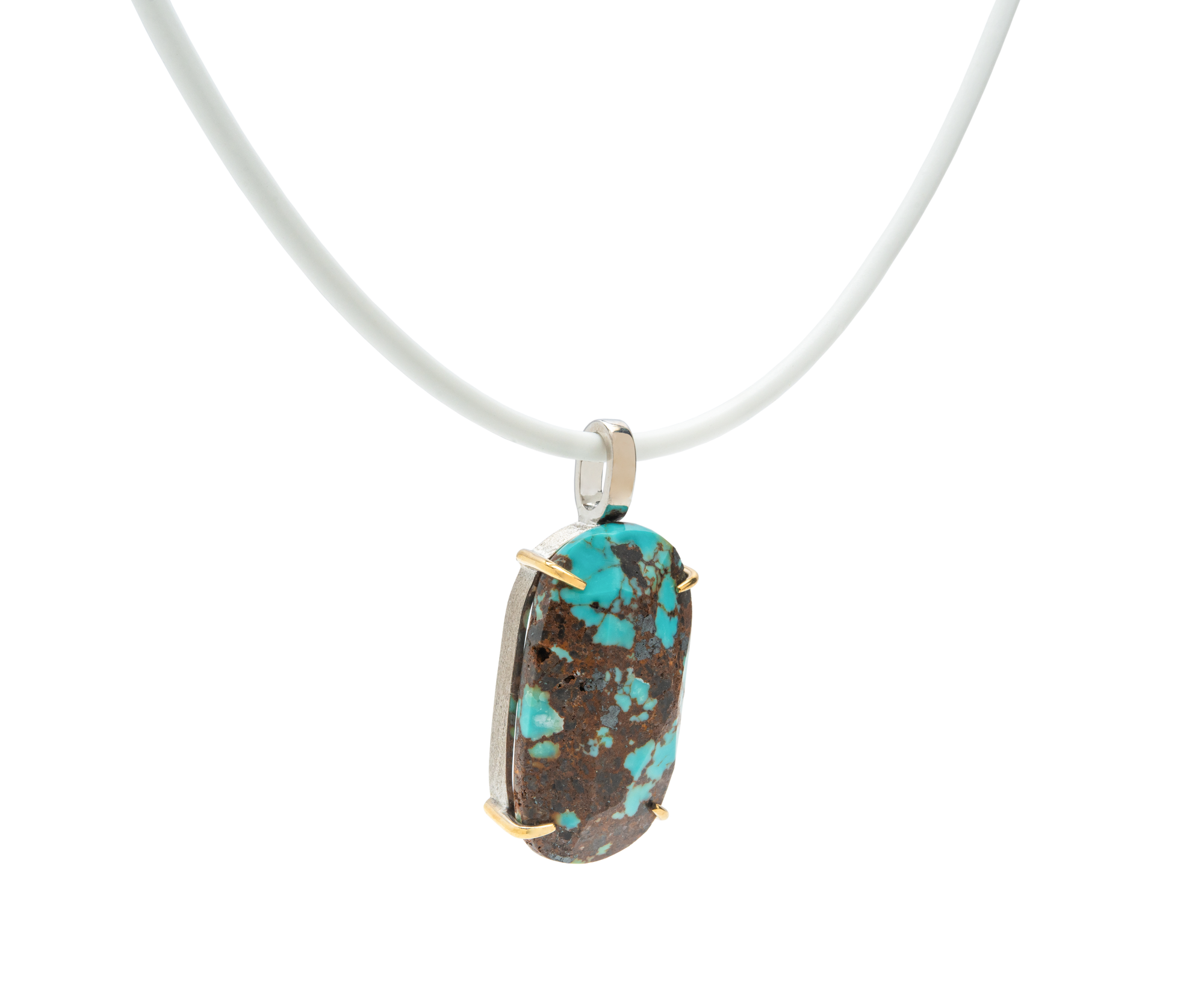 Handmade raw turquoise pendant from Japan, featuring natural stone and modern gold accents on a white cord.