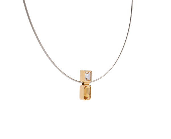 Elevé Yellow Emerald and Topaz pipe pendant with stainless steel chain, featuring 18k Gold accents.