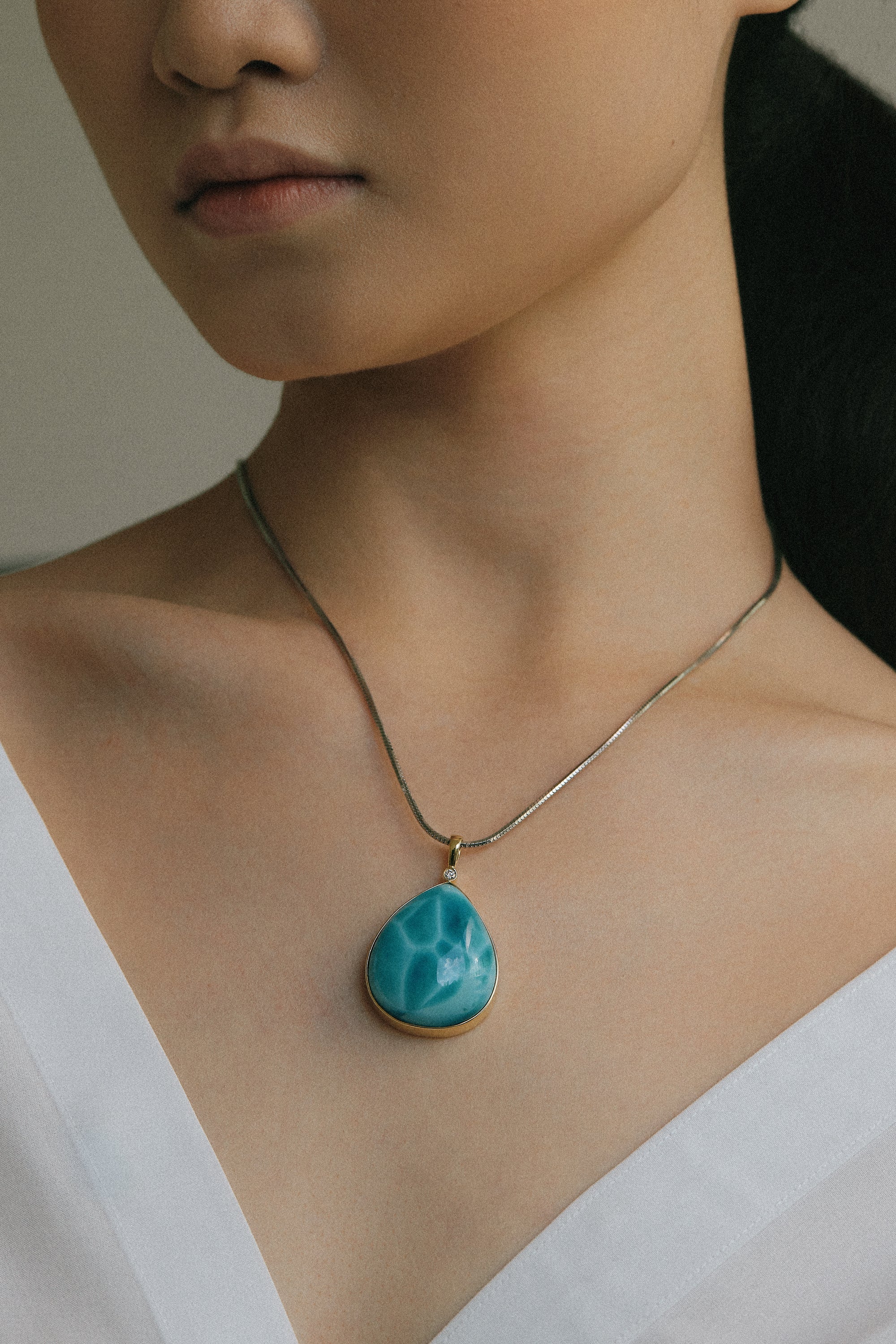 Ocean-inspired Larimar pendant with smooth polished finish