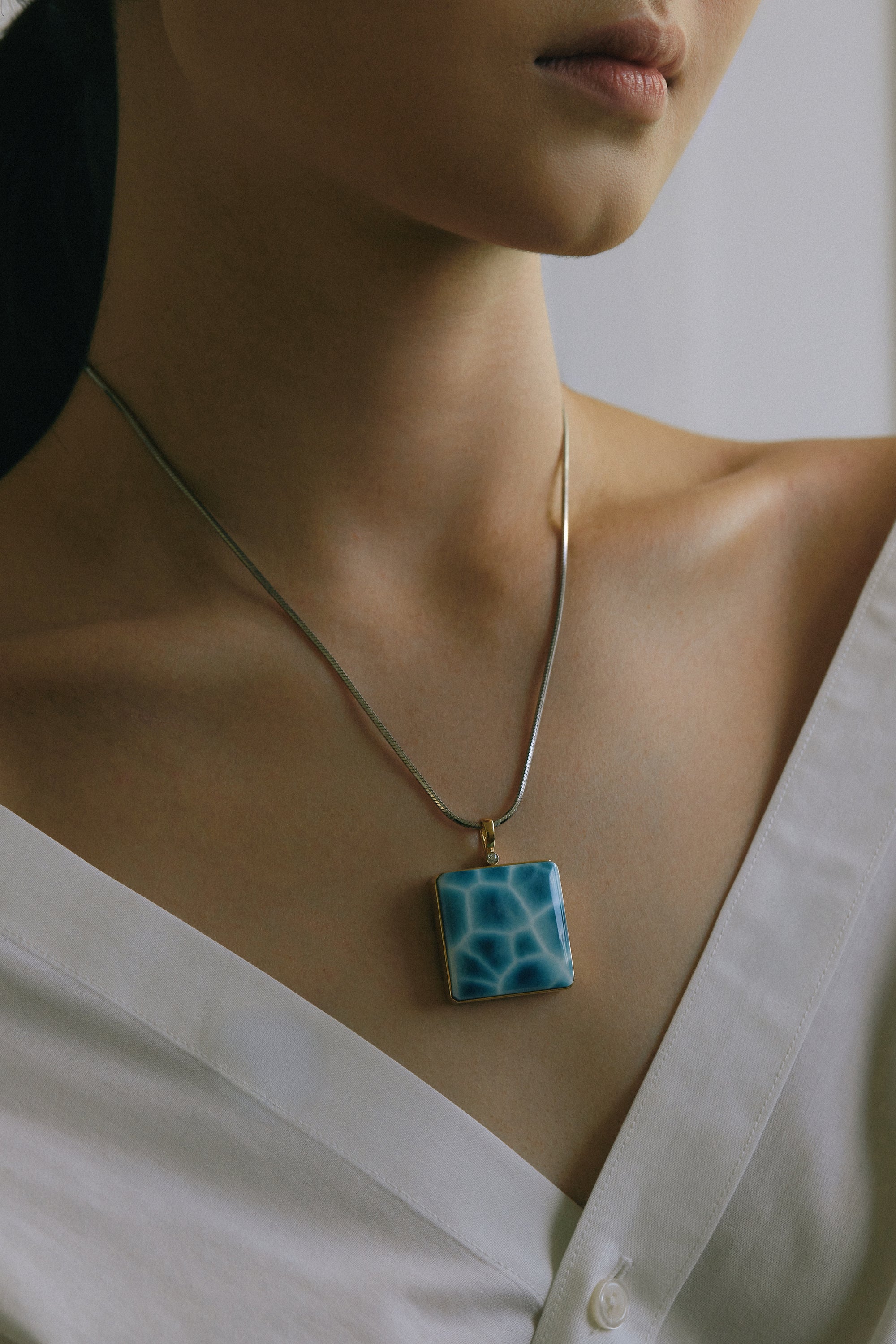 Natural Larimar pendant with vivid ocean blue tones