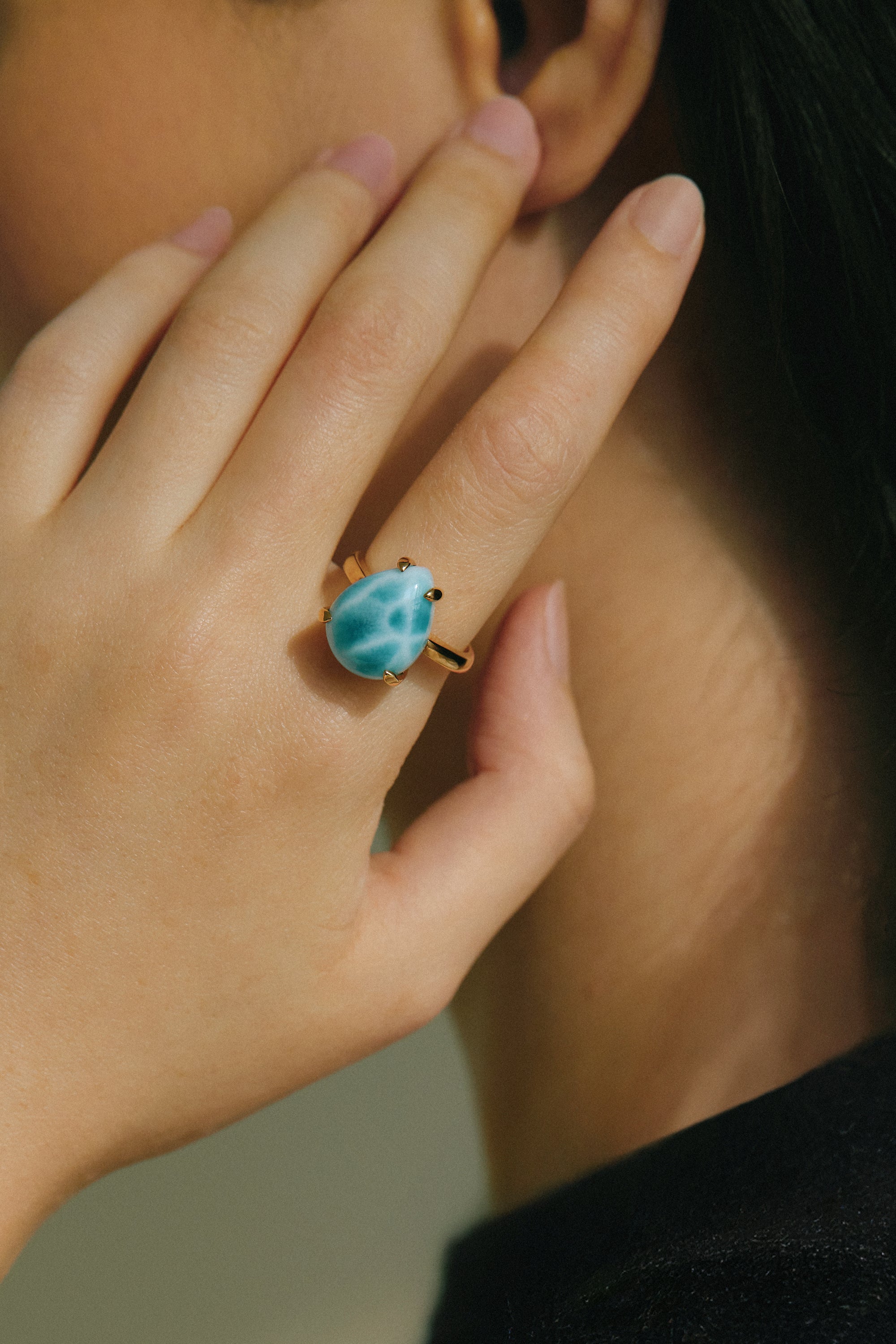 Artisan-crafted Larimar ring with unique claw prong mount