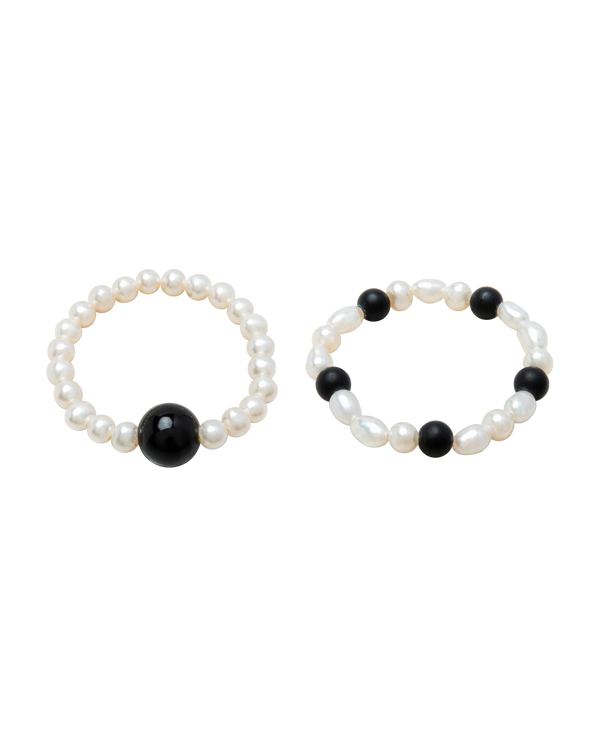 Moon & Midnight Obsidian & Pearl Ring Duo featuring black obsidian and Borneo freshwater pearls.