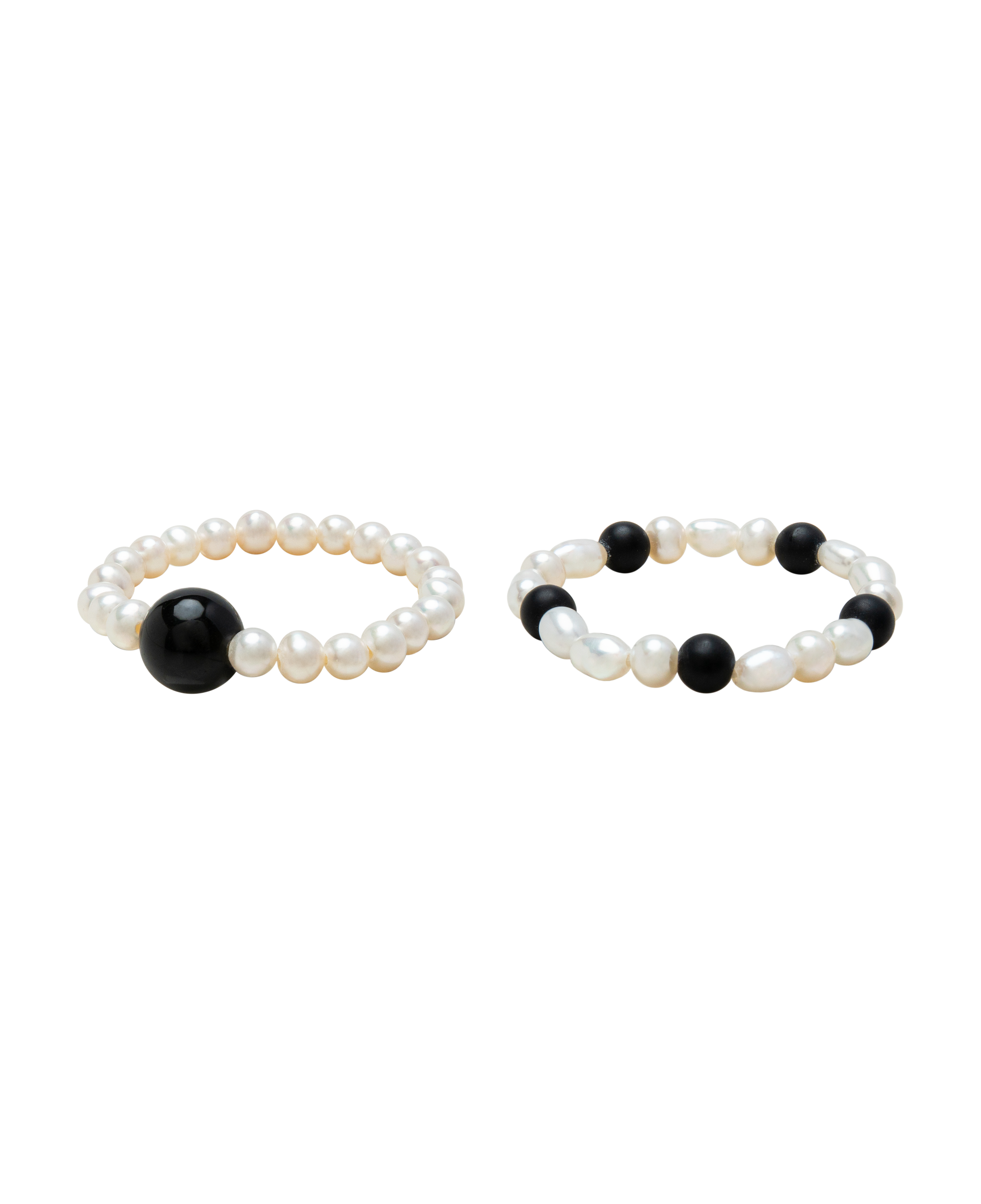 Moon & Midnight Obsidian & Pearl Ring Duo featuring black obsidian and freshwater pearls on elegant bands.
