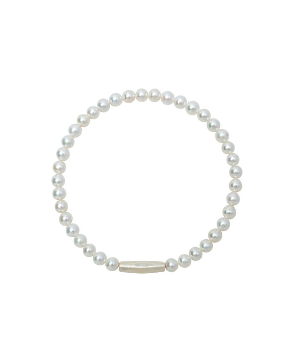 baby freshwater pearl bracelet featuring lustrous pearls and a matte sterling silver clasp.