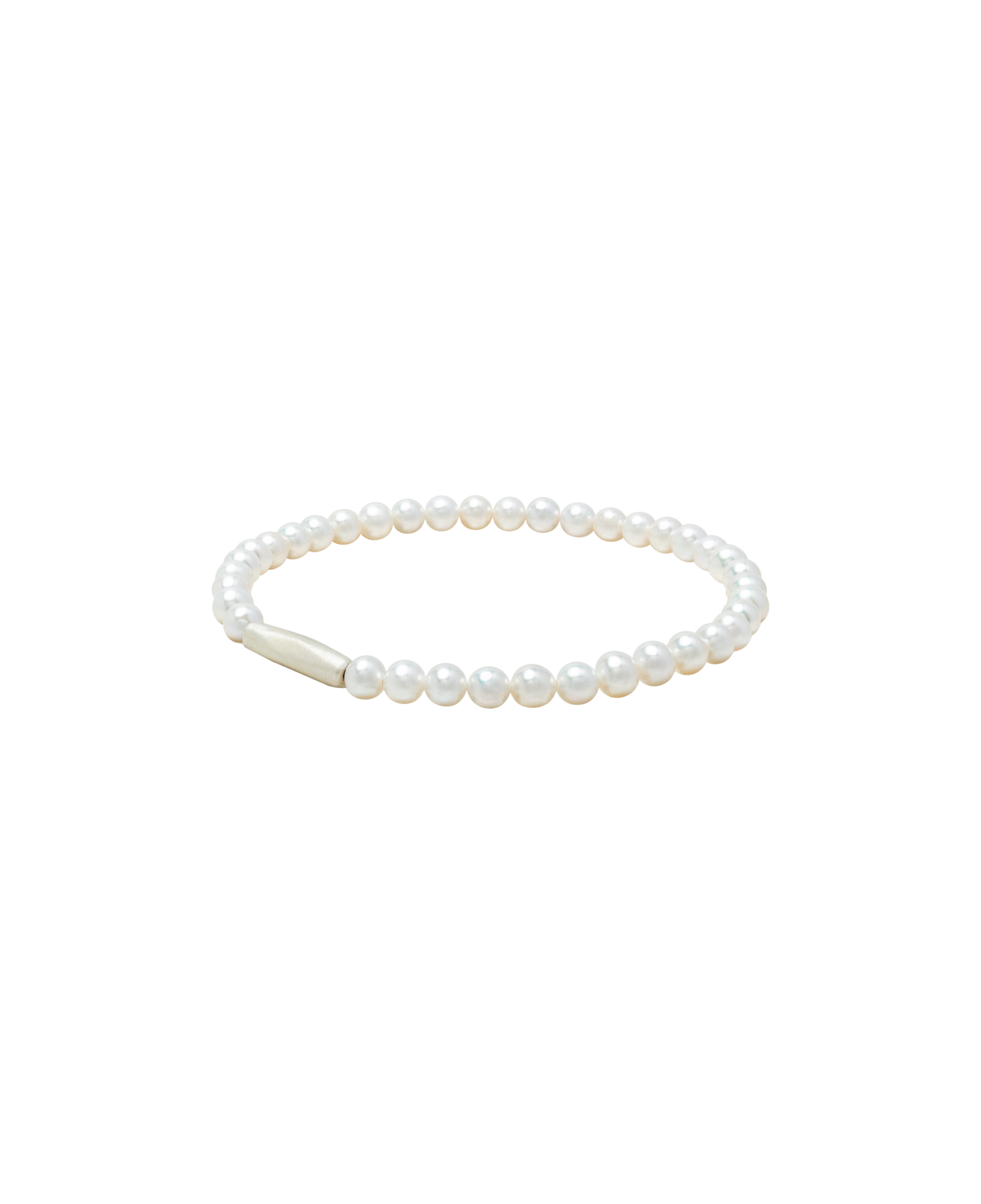 Aya Pearl Bracelet featuring baby freshwater pearls and a matte sterling silver clasp.