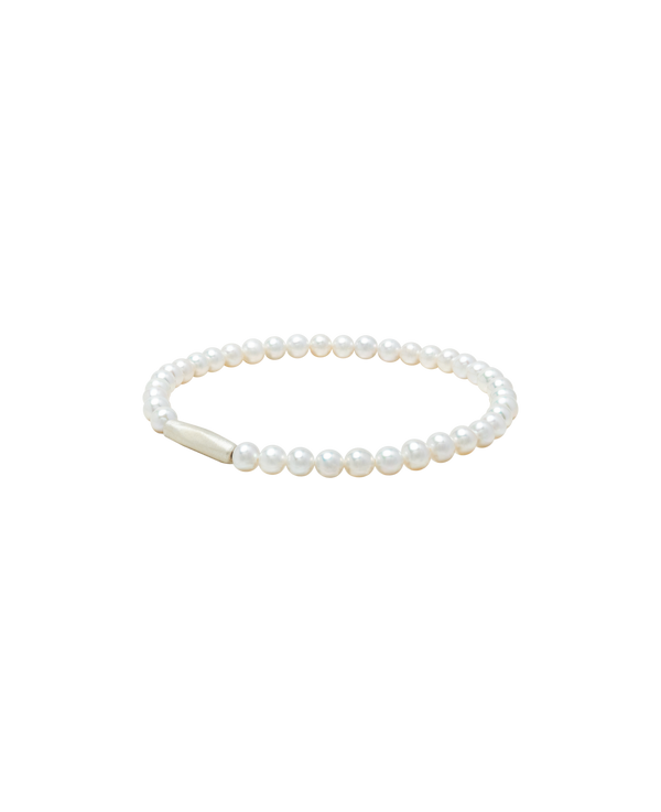 Aya Pearl Bracelet featuring baby freshwater pearls and a matte sterling silver clasp.