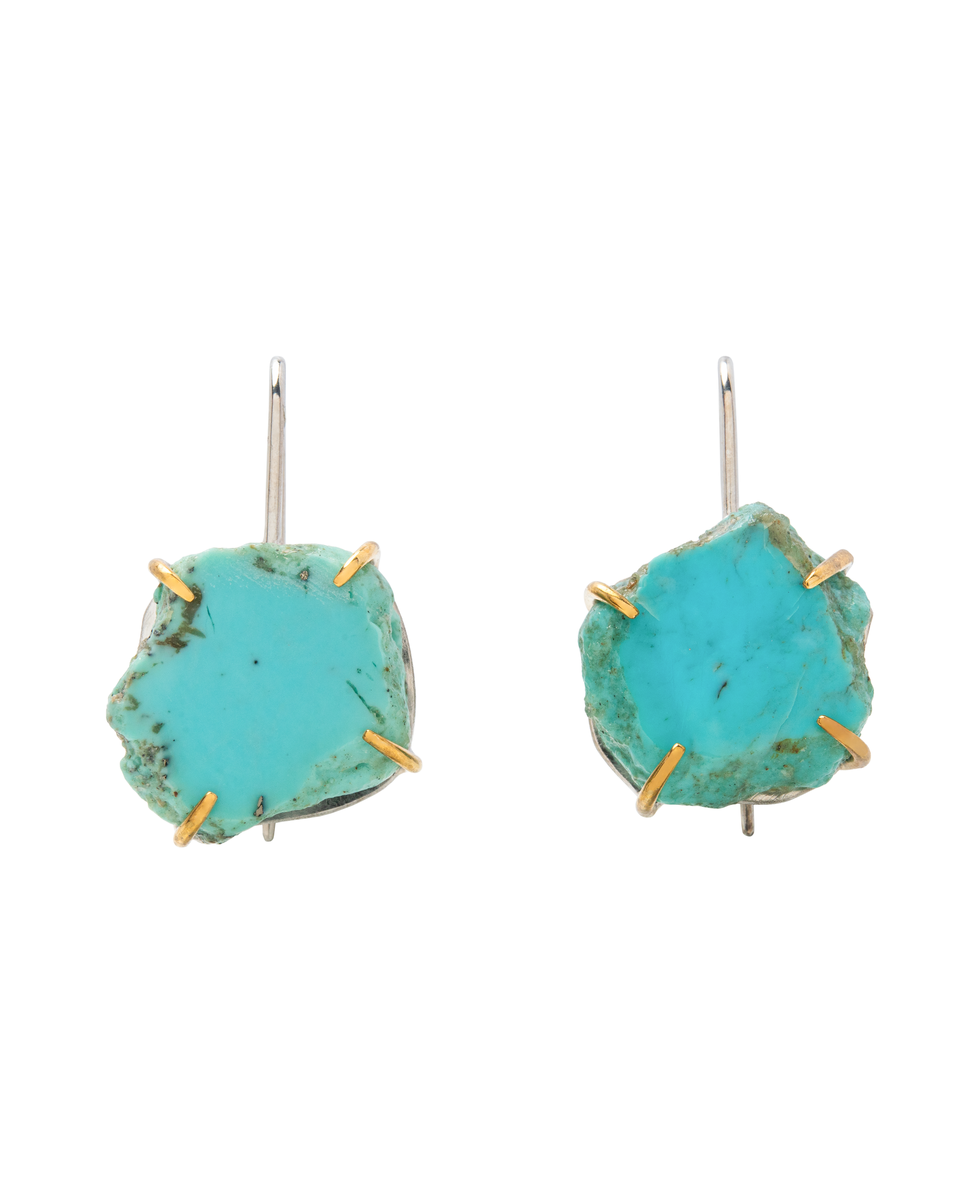 Raw turquoise handmade ear hook earrings with claw settings highlighting organic beauty.