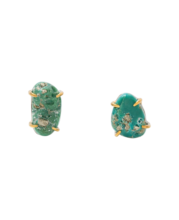 Raw turquoise ear studs with pyrite flecks, handcrafted in Japan, showcasing natural beauty and unique design.