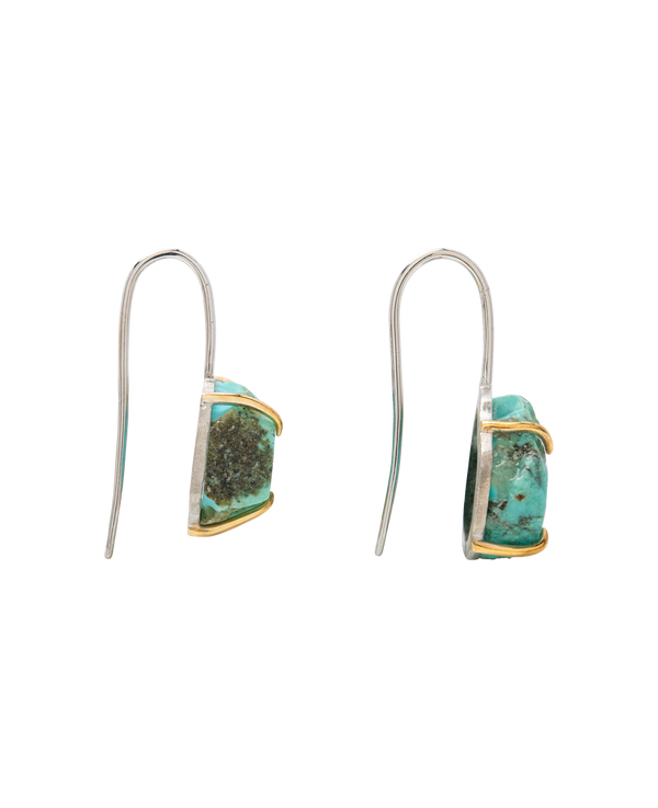 Raw turquoise handmade ear hook earrings with claw set stones in minimalist design, showcasing natural beauty.