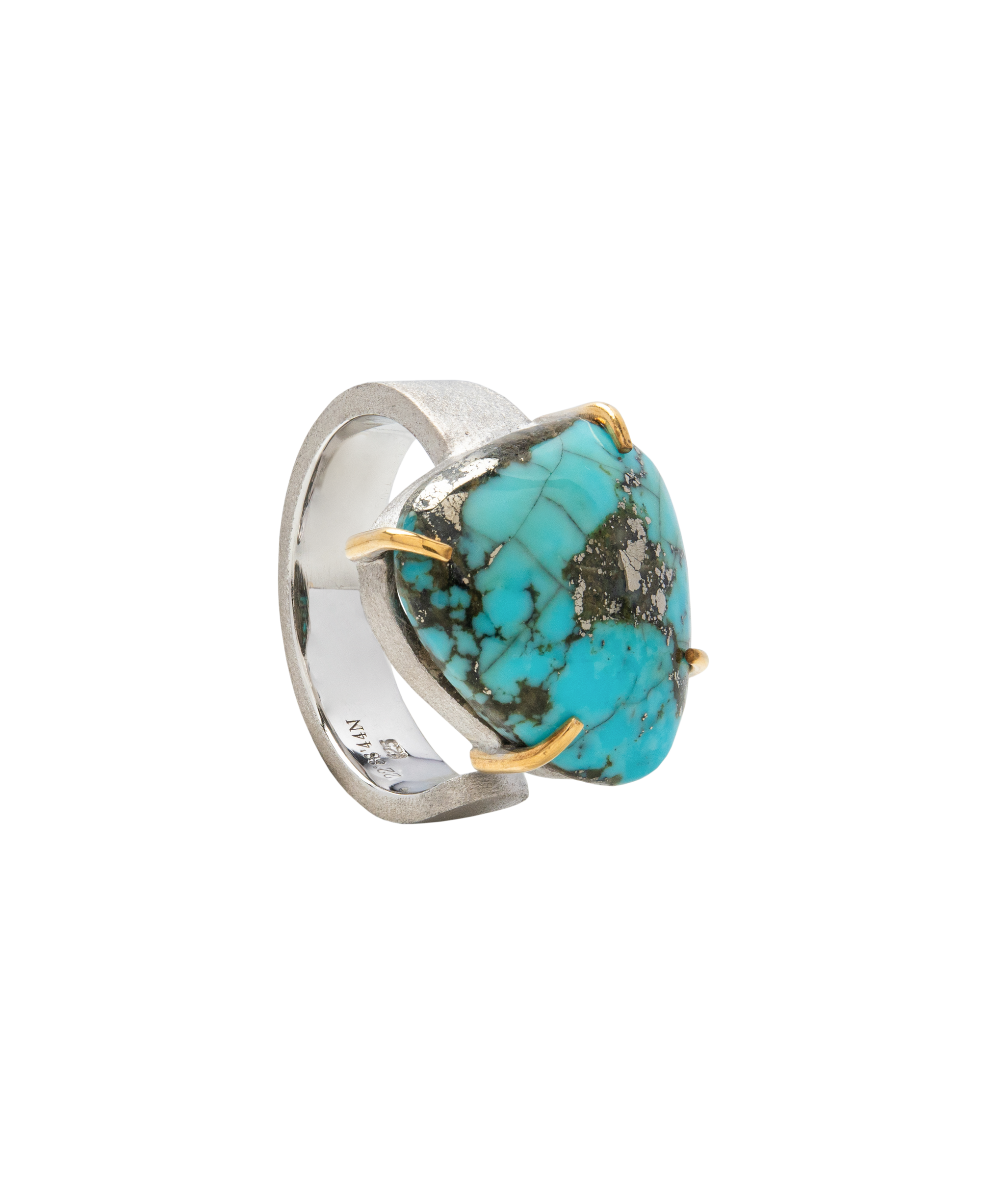 Turquoise handmade open shank ring showcasing a unique raw turquoise stone, symbolizing balance and protection.