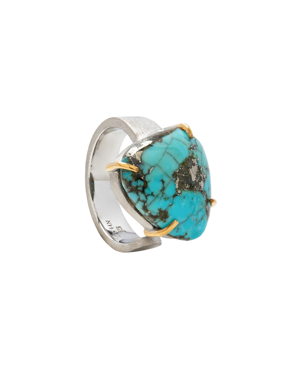 Turquoise handmade open shank ring showcasing a unique raw turquoise stone, symbolizing balance and protection.
