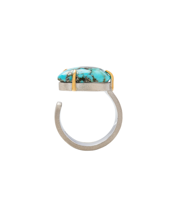 Turquoise handmade open shank ring with raw turquoise gemstone, showcasing modern simplicity and ancient depth.
