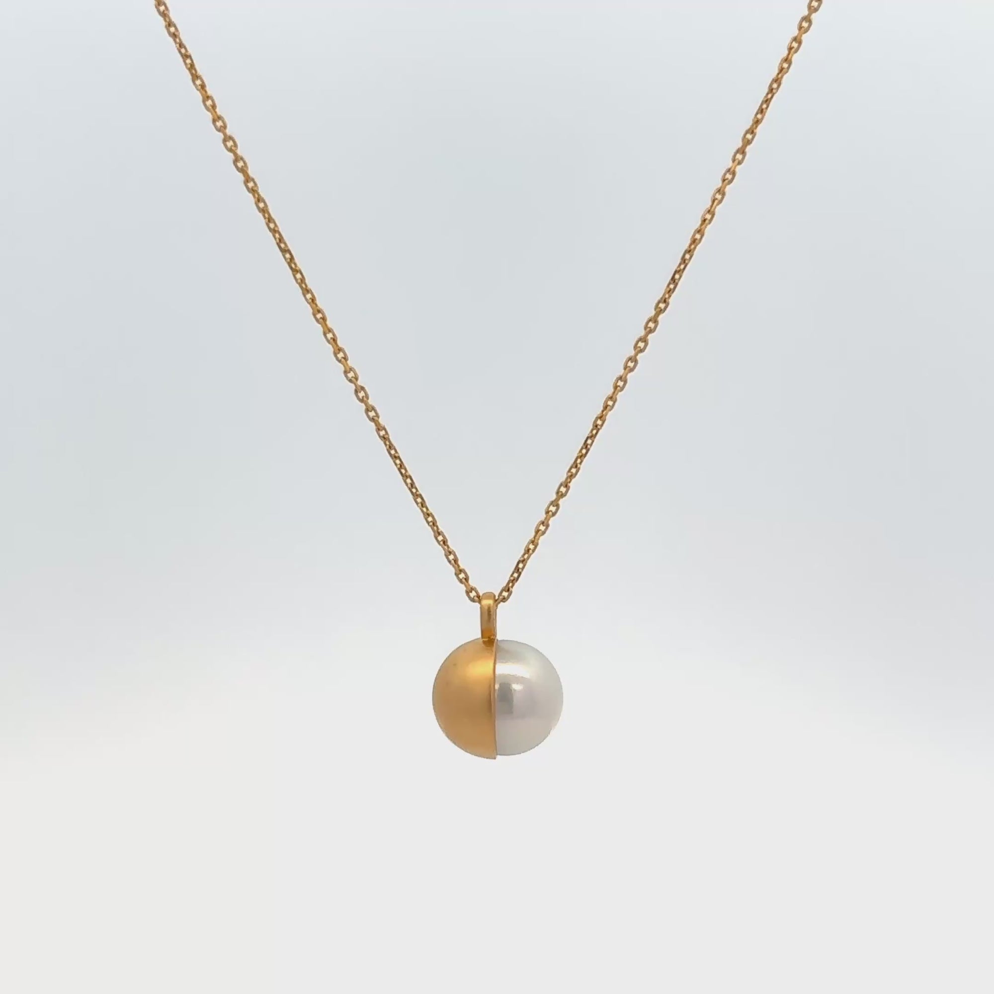 Yukimoto Bullet Pearls necklace featuring minimalist bullet design