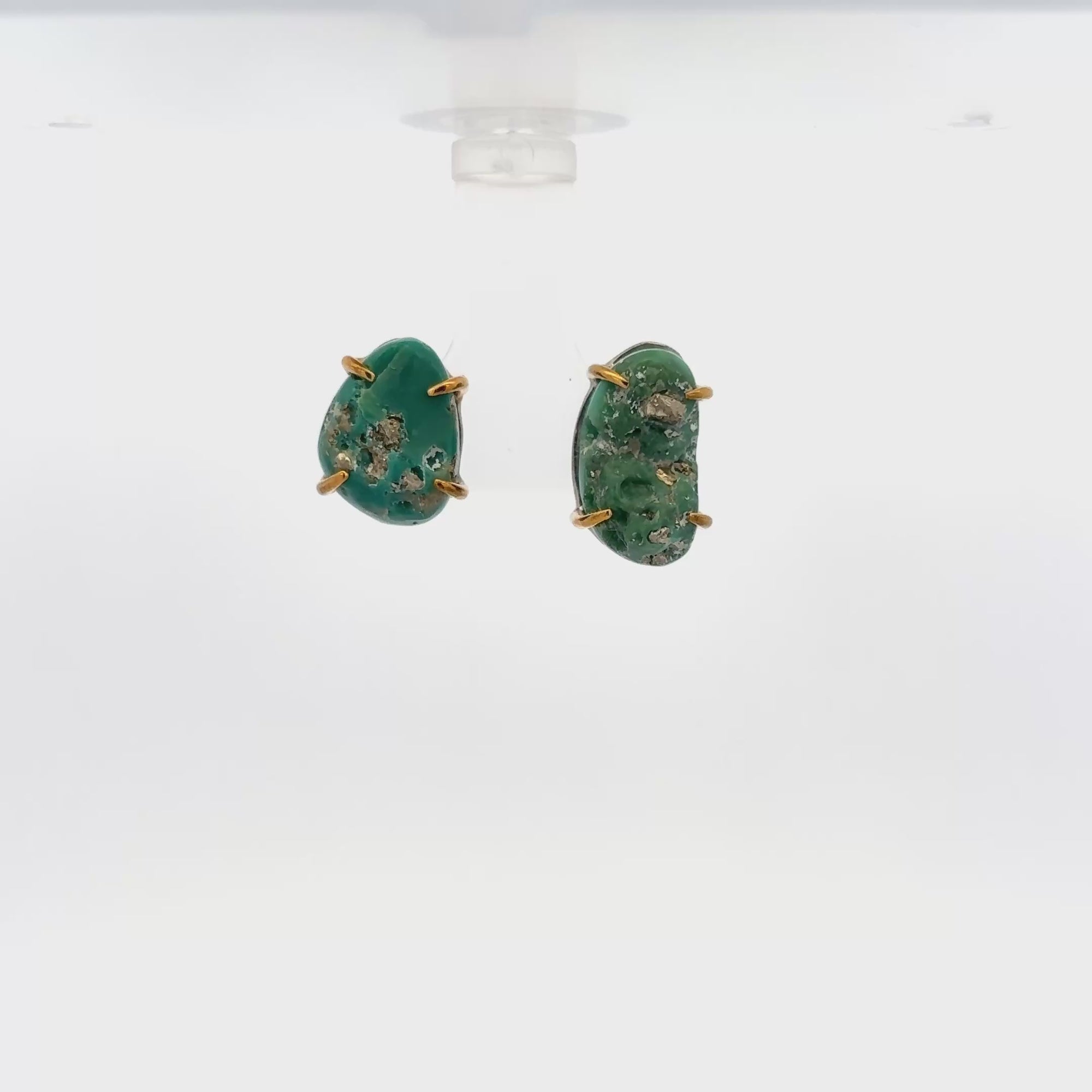 Raw turquoise handmade ear studs with pyrite flecks, showcasing unique earthy tones and gold accents.